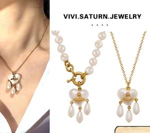 Collar y Pendientes de Perlas de Tres Gotas Saturno Versión Alta Western Queen Mother Vivienne, Joyería de Corazón con Borla Atrapasueños - Product Image 1