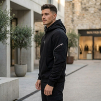 Sweat à capuche tactique noir Techwear avec impression demi-masque, fermeture éclair, poche cargo sur le bras, en French Terry écologique, personnalisable, ODM, vente en gros, style urbain, collection Printemps
