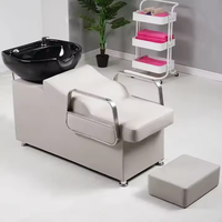 Fauteuil de lavage minimaliste en métal pour salon de coiffure, chaise de beauté élégante en cuir PU imperméable pour lavage du visage et salle de bain
