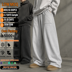 Pantalon de jogging unisexe en molleton bouclette 100 % coton, coupe ample, épais, vierge, à jambe large et effet empilé - Product Image 1