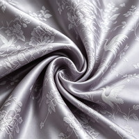 Fabricant professionnel de tissu jacquard 100% polyester écologique, doux et texturé, largeur 58/60 pouces, pour pyjamas et robes de nuit pour femmes