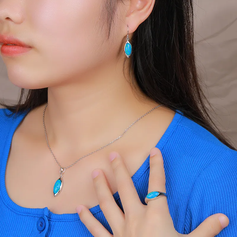 XYOP Synthetic OPAL Blue Oval Horse Eye Jewelry Set Earrings Pendant Ring Light Gold Wholesale