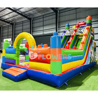 Château gonflable Fiveflowers coloré en forme de blocs de construction avec toboggan pour fêtes en extérieur