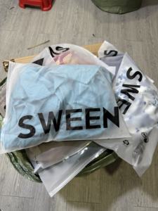 Used Clothing Bundles in Transparent Bags for Resale or <b>Donation</b> - Product Image 5