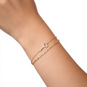 สร้อยข้อมือประดับกุญแจโรสโกลด์และเพชรแล็บโกรว์ - Product Image 1