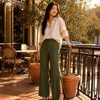Pantalon large tissé ZIPLINE Spring pour femme. Fermeture éclair latérale respirante, fente à la cheville, couture plissée haute au centre, silhouette spectaculaire