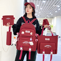 Sac à dos scolaire tendance en toile de grande capacité, nouveau style, léger, ensemble multi-pièces, coussin d'air, unisexe, sac à livres pour étudiants