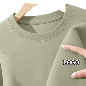 Camiseta de punto de manga larga para hombre, de color sólido, cuello redondo, corte regular, de algodón, informal, con logo en la manga izquierda. - Product Image 1