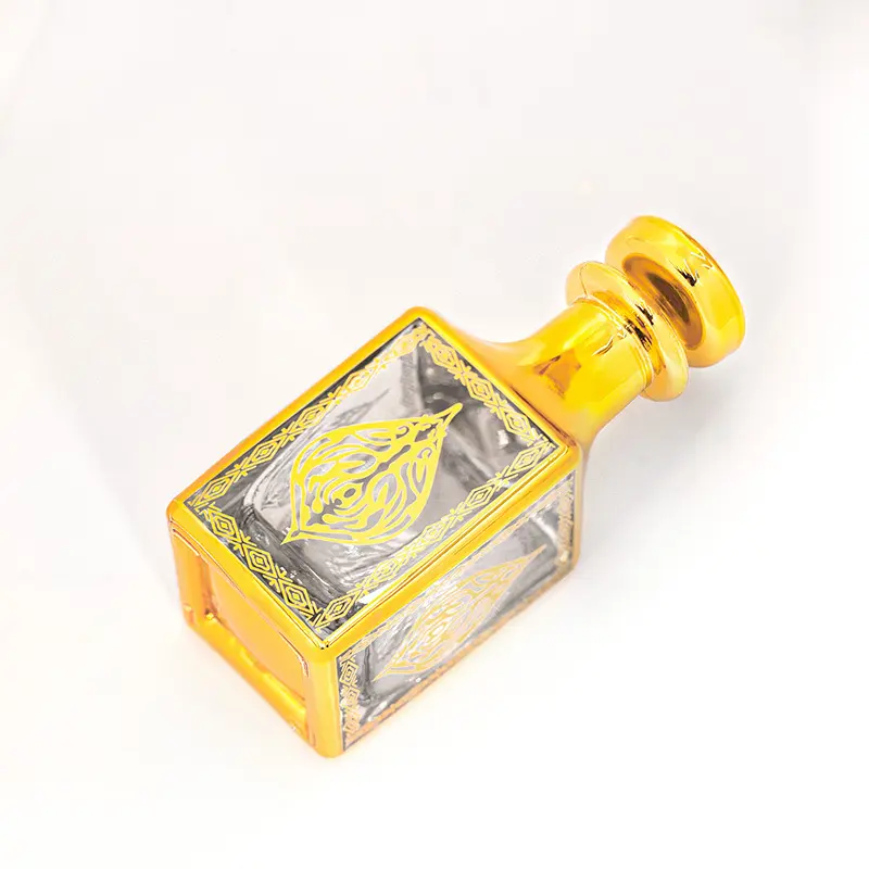 Penjualan laris botol kaca esensial minyak esensial Dubai Timur Tengah botol kaca parfum berlapis elektro 150ml botol emas patung radium