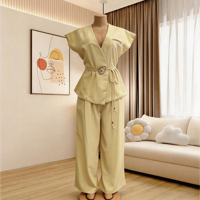 Ensemble élégant deux pièces pour femme, vente en gros d'usine, décontracté d'été, sans manches, avec ceinture, gilet et pantalon large, couleur unie, idéal pour le bureau