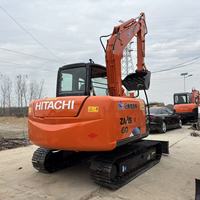 Excavatrice Hitachi ZX60 d'occasion 99% neuve, modèle 2023, moteur Hitachi, pompe JCB, poids opérationnel de 6 tonnes, prix bas, construction