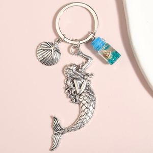 Llavero marino con concha, estrella de mar y caracola, botella de líquido en movimiento, llaveros de los deseos, regalos de amistad, joyería hecha a mano - Product Image 5