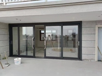 Porte coulissante industrielle robuste en aluminium à rupture de pont thermique, résistante aux ouragans, avec verre insonorisé, pour villa côtière