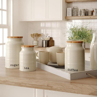 Vente en gros Bocal de rangement en céramique blanche personnalisé Boîte à café, sucre et thé avec couvercle pour les rangements domestiques et les bocaux à biscuits