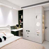 Armoire Moderne Blanche pour Enfants, Meuble de Rangement pour Crèche avec Bureau Intégré et Miroirs Circulaires pour Zone Junior