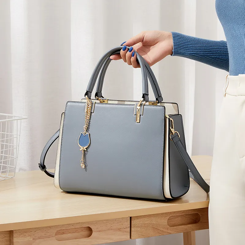 Fashional China manufacturer custom logo girls handbags trends genuine leather Blue shoulder hand bag in bulk