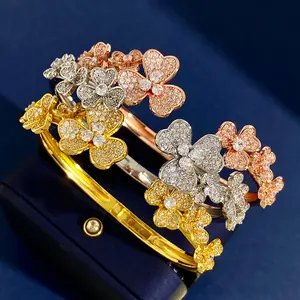 Di lusso Top Brand Designer braccialetto gioielli Tredy casuale in acciaio inox 18K braccialetto in oro con quattro foglie di trifoglio fiori