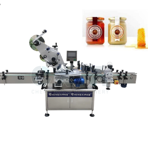 Applicateur d'étiquettes multifonctionnel pour le dessus et les côtés des boîtes, des bouteilles et des contenants, système d'étiquetage de haute précision - Product Image 1