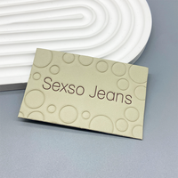 Étiquette en cuir véritable personnalisée de haute qualité avec logo en relief pour sacs et jeans