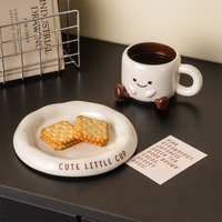 Dessin animé mignon souriant tasse et soucoupe mode spécial céramique meilleure vente tasses à café pas cher belle lisse confortable tasse