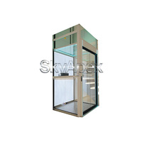 Ascenseur résidentiel compact EXW 400 kg, 3 à 5 étages, système de sécurité à porte automatique, gain de place pour maisons, personnalisable
