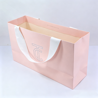 Fabricants de sacs en papier cosmétiques roses de luxe personnalisés avec logo imprimé pour emballages de shampooings et lotions, vente en gros