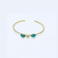 Bracelet ajustable torsadé minimaliste créatif en malachite plaqué or 18 carats avec fleur pierre de naissance pour femme