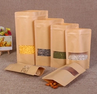 Vente chaude en plastique fermeture à glissière fermeture emballage PE fermeture à glissière haut sac de pochette en papier Kraft avec fenêtre autoportante surface en relief