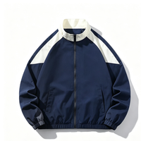 Blouson Bomber Homme Col Montant Patchwork Color Block Manches Raglan Imperméable Coupe-Vent Zippé Vêtement d'extérieur Décontracté Sportif Ample