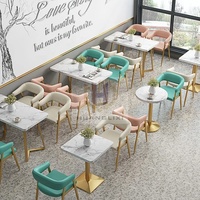 Vente chaude en cuir avec 2 chaises Table en métal et pieds de chaise Meubles de magasin de café de loisirs