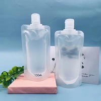 Vente en gros de pochette vide en plastique pour emballage de boisson liquide avec bec verseur 50 100ML PE pochette transparente avec bec verseur