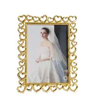 Cadre photo en métal doré à motif floral de style européen, centre de table de mariage, cadre photo en métal fait à la main