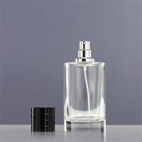Vente en gros de vaporisateurs de luxe, flacon en verre transparent pour parfum, cylindre vide de 100 ml, emballage en boîte, logo personnalisé