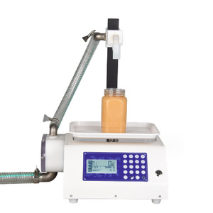 Máquina automática de llenado de miel 6L/min con embalaje de botellas de lujo y báscula de pesaje - Product Image 1