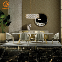 Ensemble de table à manger en marbre de style européen de luxe, table à manger et chaises modernes avec base en acier inoxydable