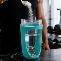 Bouteille shaker de sport colorée 680 ml sans BPA pour protéines, fitness et entraînement, avec mélangeur intégré pour la gym