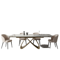 Table à manger 6 places avec plateau en pierre frittée et pieds en métal croisés