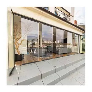 Foshan door suppliers automatic motorised frameless tempered frosted glass folding wall door system