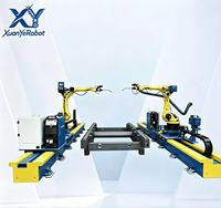 Station de travail robotisée de soudage automatique STEP SA12/2000H avec rail au sol pour robot 6 axes et structure en acier au carbone robuste