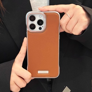 Funda Magnética de Cuero Marrón para Teléfono Apple <span class=keywords><strong>iPhone</strong></span> 13 <span class=keywords><strong>14</strong></span> 15 16 <span class=keywords><strong>Pro</strong></span> Max, Funda de Alta Gama sin Bisel con Carga Inalámbrica - Product Image 1