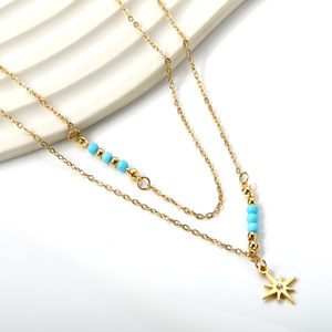 Collar de doble cadena dorado de estilo europeo y americano con colgante de estrella y cuentas azules para mujer - Product Image 1
