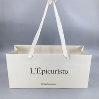 Sacs cadeaux en papier recyclé personnalisés de luxe avec gaufrage et revêtement UV