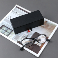 Étui à lunettes en cuir haut de gamme avec doublure en velours pour le rangement des lunettes, adapté à l'emballage de marque dans les magasins d'optique