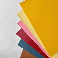 Tissu en cuir artificiel PVC extensible durable gaufré économique imperméable anti-moisissure ignifuge tricoté