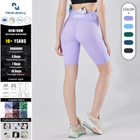 Shorts de sport taille haute pour femme avec logo personnalisé, séchage rapide, poches latérales pour téléphone, contrôle du ventre, pour yoga et gym, vente en gros