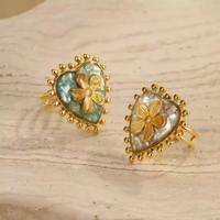 Bague ouverte ajustable tendance en acier inoxydable plaqué or 18 carats avec coquillage floral en résine, style bohème, pour femme, cadeau délicat pour elle