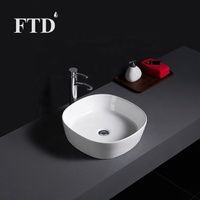Lavabo en céramique à poser au-dessus du comptoir, design moderne et épuré, pour hôtel, avec forme de bassin unique, capacité de 9 L, pour salle de bain