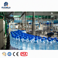 Machine automatique 3 en 1 pour le remplissage, le rinçage et le bouchage de bouteilles PET pour l'embouteillage d'eau pure, idéale pour les petites entreprises.