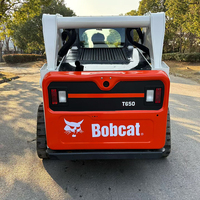 Chargeuse compacte à direction par déplacement (Skid Steer Loader) robuste, conception à levage vertical, force de rupture élevée, Bobcat S650, machine compacte d'occasion