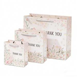 ถุงกระดาษช้อปปิ้งหรูหราเป็นมิตรกับสิ่งแวดล้อม KM พร้อมหูหิ้วริบบิ้นสำหรับบรรจุภัณฑ์ของขวัญและเสื้อผ้า - Product Image 4